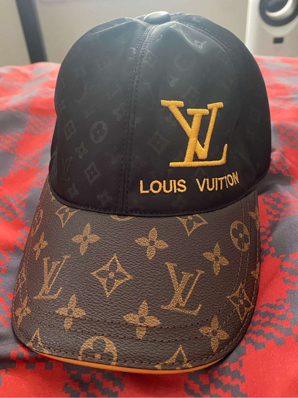 A Louis Vuitton look Black and brown Cap
